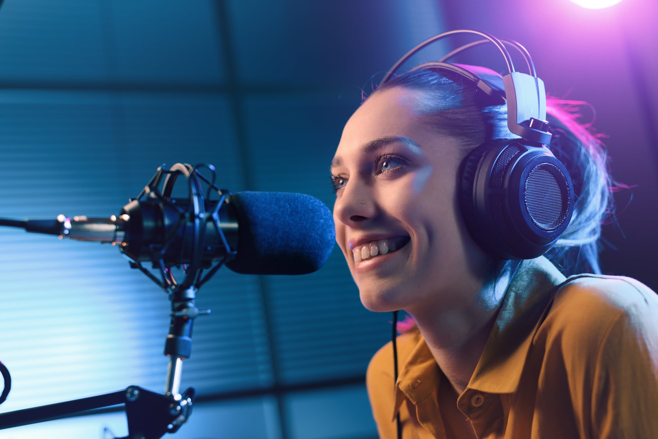 Young Woman Working at the Radio Station